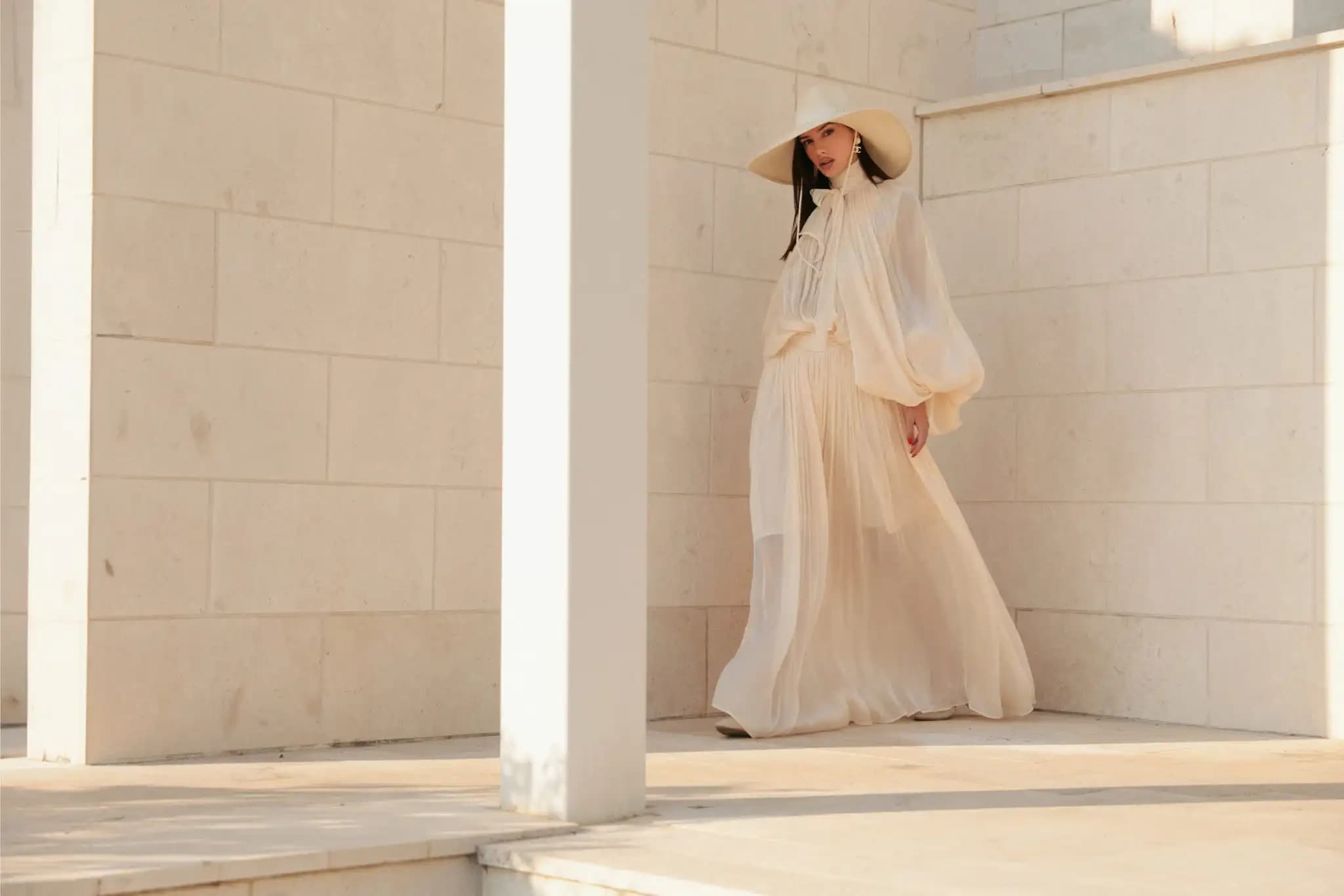 Woman wearing an elegant cream outfit